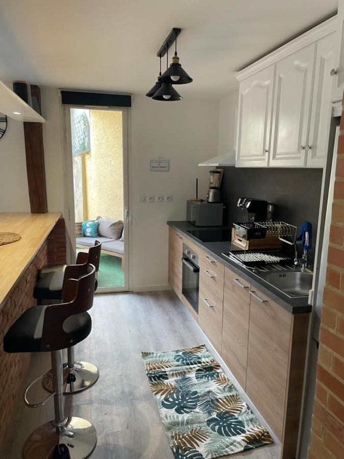 Appartement En Rez De Jardin Tout Equipe 弗洛恩斯 外观 照片